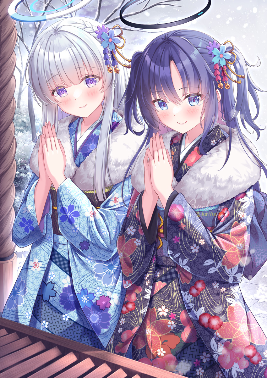 2girls bare_tree black_kimono blue_archive blue_eyes blue_hair blue_kimono blush closed_mouth commentary_request floral_print fur_collar grey_hair halo highres japanese_clothes kimono long_hair long_sleeves looking_at_viewer multiple_girls noa_(blue_archive) obi outdoors own_hands_together palms_together parted_bangs print_kimono purple_eyes sash shirakawako smile snow snowing tree two_side_up very_long_hair wide_sleeves yuuka_(blue_archive)