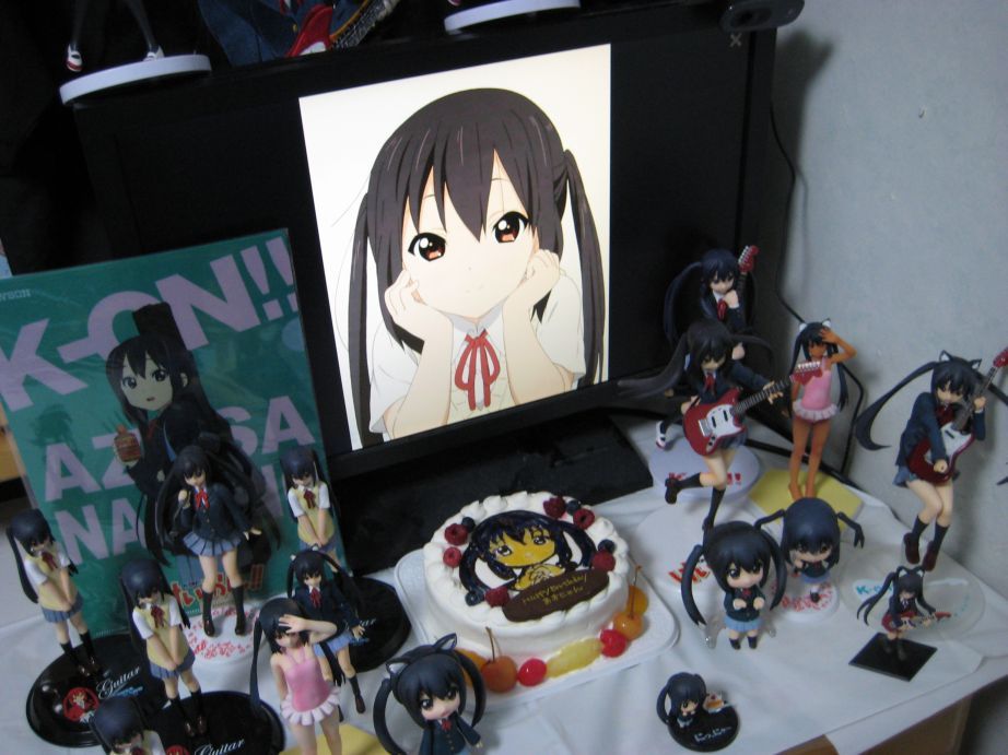 2d_dating birthday black_hair cake figure food hands_on_own_cheeks hands_on_own_face k-on! lonely long_hair monitor nakano_azusa nendoroid photo school_uniform twintails