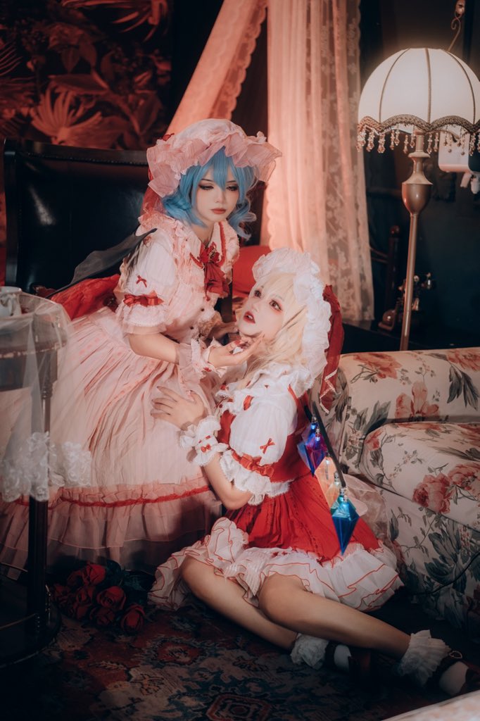 2girls ascot bat_wings black_footwear blonde_hair blue_hair bobby_socks bouquet breasts closed_mouth collared_shirt cosplay cosplay_photo couch curtains flandre_scarlet flandre_scarlet_(cosplay) floral_print flower frilled_shirt_collar frilled_sleeves frills full_body hair_between_eyes hat indoors lamp mary_janes medium_hair mob_cap multicolored_wings multiple_girls open_mouth photo_(medium) pink_headwear pink_shirt pink_skirt puffy_short_sleeves puffy_sleeves red_ascot red_flower red_rose red_skirt red_vest remilia_scarlet remilia_scarlet_(cosplay) rose rug shirt shoes short_sleeves skirt small_breasts socks teeth touhou upper_teeth_only vest white_curtains white_headwear white_shirt white_socks wings wrist_cuffs ysu2211