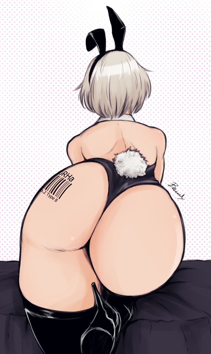 1girl animal_ears ass ass_focus ass_tattoo back barcode barcode_tattoo bawdy_art bent_over black_footwear black_leotard boots character_name commentary detached_collar english_commentary fake_animal_ears fake_tail from_behind grey_hair high_heel_boots high_heels highres leotard nier_(series) nier_automata on_bed playboy_bunny polka_dot polka_dot_background rabbit_ears rabbit_tail short_hair signature solo strapless strapless_leotard tail tattoo thick_thighs thigh_boots thighs yorha_no._2_type_b