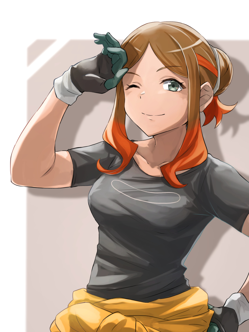 1girl ;) black_shirt breasts brown_hair closed_mouth clothes_around_waist collarbone commentary_request eyelashes gloves green_eyes hair_bun hand_on_own_hip hand_up highres itsudzumi multicolored_hair one_eye_closed orange_hair orla_(pokemon) parted_bangs pokemon pokemon_(anime) pokemon_horizons shirt short_sleeves sidelocks smile solo t-shirt