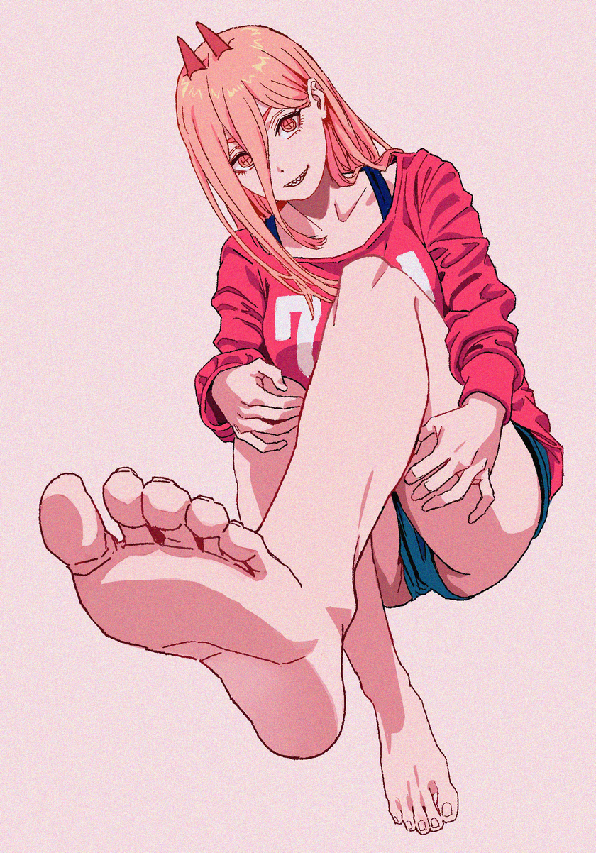 1girl barefoot chainsaw_man cross-shaped_pupils feet foot_focus foreshortening hair_between_eyes highres horns long_hair parted_lips pink_background pink_hair pink_sweater power_(chainsaw_man) red_horns sharp_teeth shiren_(ourboy83) simple_background smile solo sweater symbol-shaped_pupils teeth