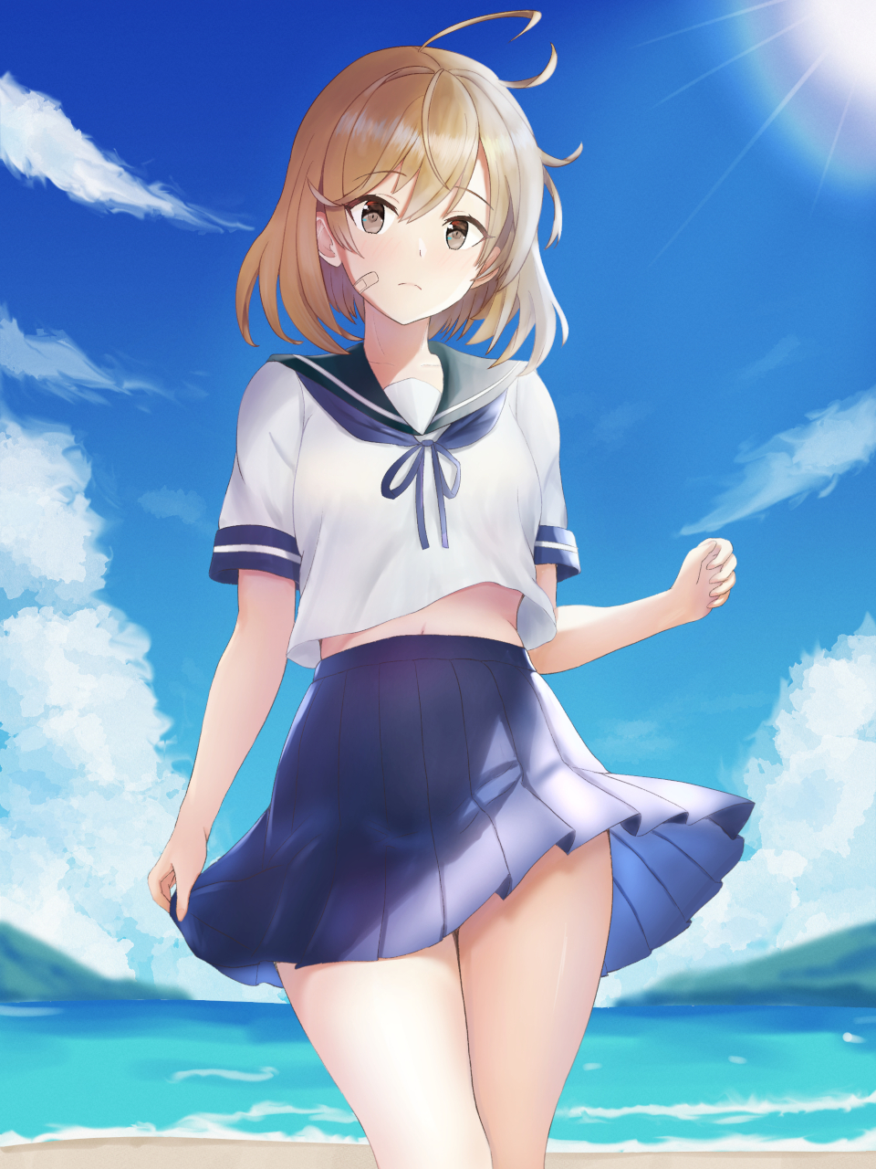 1girl ahoge bandaid bandaid_on_face beach blue_sailor_collar blue_skirt blue_sky brown_eyes cloud cowboy_shot day hat highres kantai_collection kotou_yogen light_brown_hair mountainous_horizon oboro_(kancolle) outdoors pleated_skirt sailor_collar sailor_hat shirt short_hair skirt sky solo standing white_shirt