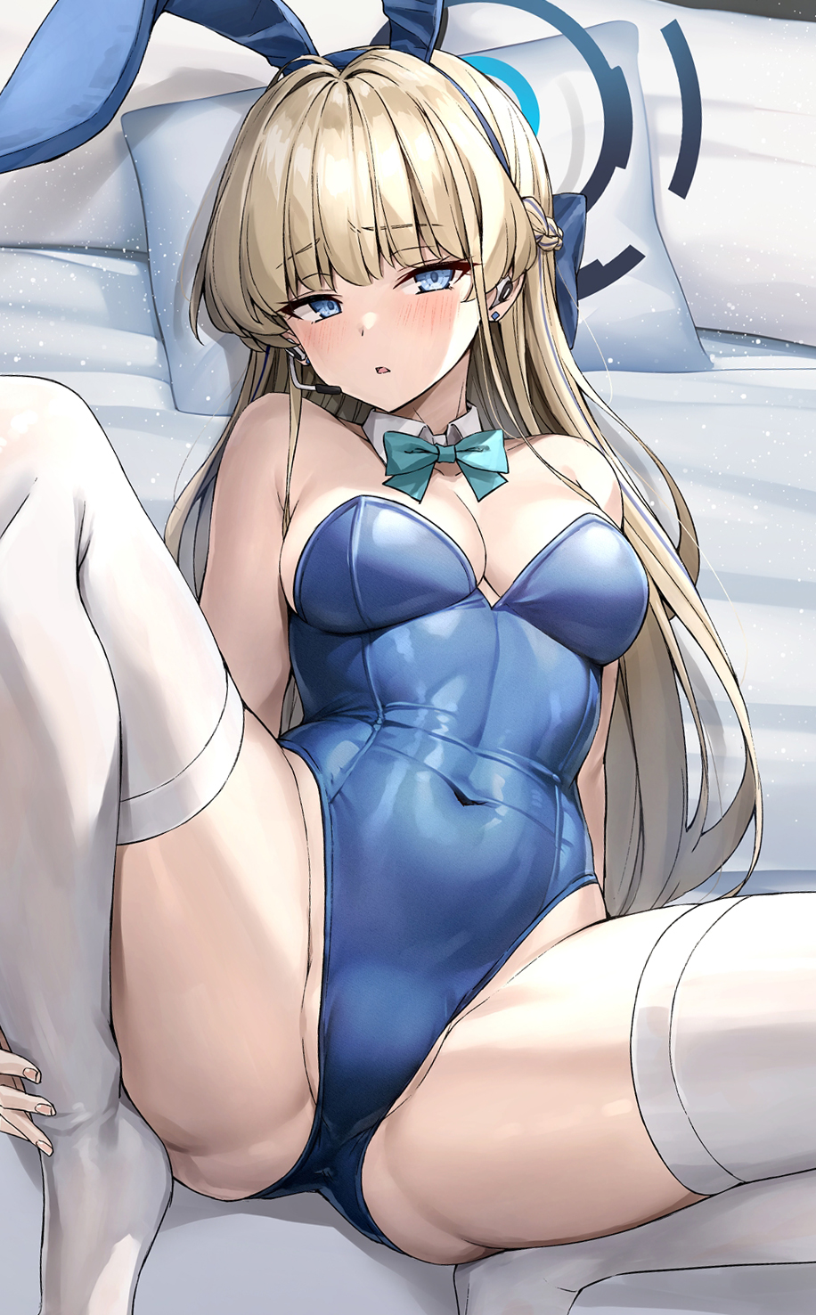 1girl animal_ears blonde_hair blue_archive blue_eyes blue_leotard bow bowtie breasts detached_collar fake_animal_ears halo highres kotatsu_(kotatsu358) leotard long_hair looking_at_viewer lying medium_breasts official_alternate_costume on_back parted_lips playboy_bunny rabbit_ears solo strapless strapless_leotard thighhighs thighs toki_(blue_archive) toki_(bunny)_(blue_archive) very_long_hair white_thighhighs