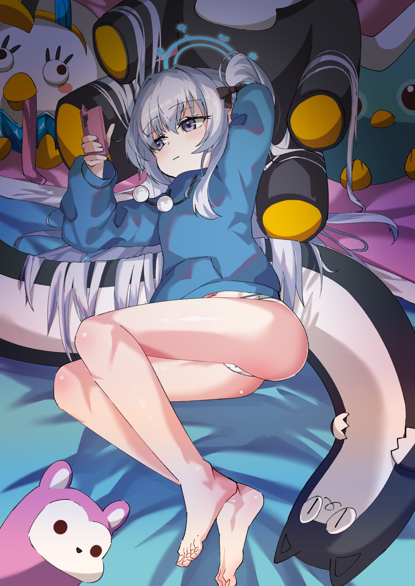 1girl ass barefoot blue_archive blue_halo blue_hoodie blush cellphone closed_mouth grey_hair halo highres holding holding_phone hood hoodie long_hair long_sleeves miyako_(blue_archive) no_pants official_alternate_costume one_side_up panties peroro_(blue_archive) phone polka_dot polka_dot_panties pom_pom_(clothes) purple_eyes smartphone solo stuffed_animal stuffed_cat stuffed_toy toes underwear white_panties yuacalo