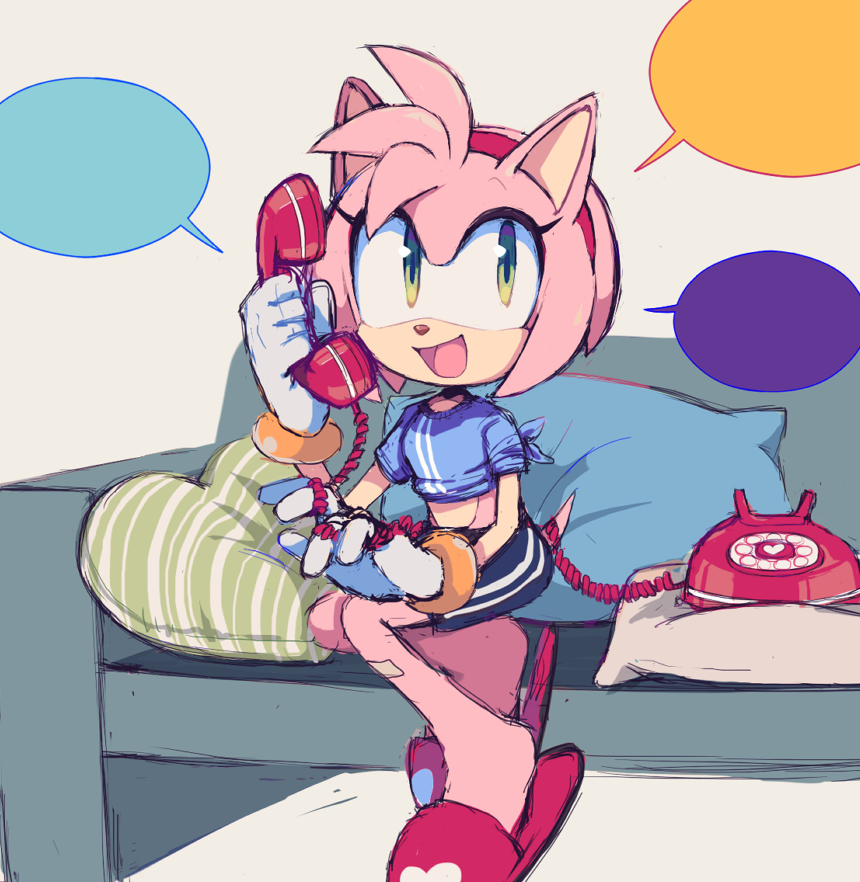 1girl :d amy_rose blue_shirt calling couch gloves green_eyes hairband looking_up motobug phone pillow red_hairband shirt shorts sitting smile solo sonic_(series) speech_bubble white_gloves