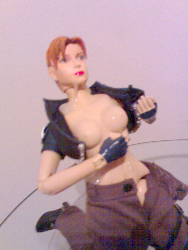 breasts breasts_outside brown_hair buckle bukkake cropped_jacket cum cum_on_body cum_on_upper_body doll_joints dutch_angle facial figure fingerless_gloves glass gloves high_heels jacket joanna_dark kneeling large_breasts leaning_back lipstick makeup no_bra no_panties open_clothes open_fly open_jacket pants perfect_dark photo semen_on_figure short_hair simple_background solo thigh_strap unbuttoned unzipped white_background