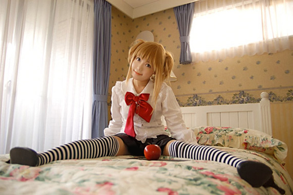amane_misa apple bangs bed cosplay death_note food fruit photo solo thighhighs two_side_up