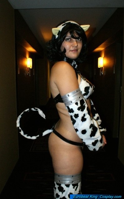 chubby clothed clothing cosplay cow_ears cow_tail cowgirl eurobeat_king female hallway human mammal overweight photo real skimpy solo tail
