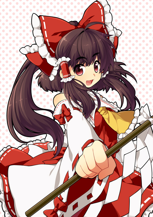 ascot bad_id bad_pixiv_id bow brown_hair clenched_hand detached_sleeves foreshortening gohei hair_bow hair_tubes hakurei_reimu kiri_futoshi open_mouth outstretched_arm polka_dot polka_dot_background ponytail red_eyes smile solo touhou