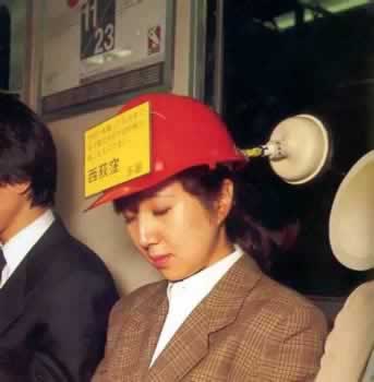 hard_hat japan sleeping subway subway_train toilet_plunger what