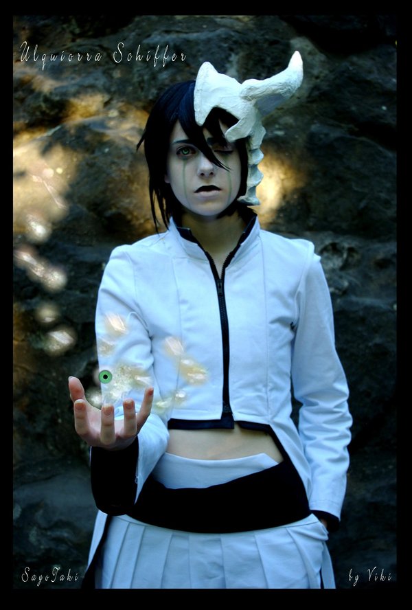 a-pumpkin arrancar bare_midriff black_hair bleach bodypaint cosplay espada expressionless facial_mark green_eyes hair_between_eyes hand_in_pocket helmet hollow midriff non-asian non_asian photo photoshop shopped skull solo ulquiorra_cifer ulquiorra_cifer_(cosplay) ulquiorra_schiffer uniform white_skin