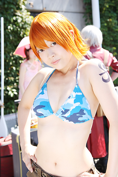 amanone_shun asian belt bikini_top camouflage capcom cargo_shorts cosplay dante dante_(cosplay) devil_may_cry dress female hands_on_hips jacket long_coat midriff nami nami_(cosplay) nami_(one_piece) nami_(one_piece)_(cosplay) one_piece orange_hair outdoors photo pink_dress plant red_jacket skypiea standing tattoo umbrella white_hair