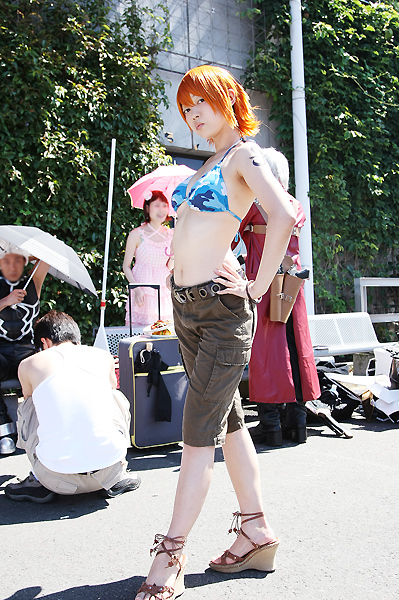 amanone_shun asian belt bikini_top boots bracelet camouflage capcom cargo_shorts cosplay dante dante_(cosplay) devil_may_cry feet female full_body hands_on_hips jacket jewelry long_coat midriff nami nami_(cosplay) nami_(one_piece) nami_(one_piece)_(cosplay) one_piece orange_hair outdoors photo pink_umbrella red_jacket sandals skypiea tattoo umbrella wedge_heels wedges white_hair