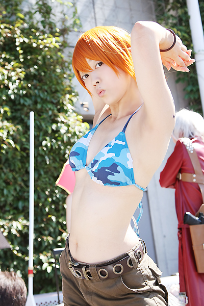 amanone_shun armpits arms_behind arms_behind_back arms_up asian belt bikini_top bracelet camouflage cargo_shorts cosplay dante dante_(cosplay) gun jacket jewelry long_coat midriff nami nami_(cosplay) nami_(one_piece) nami_(one_piece)_(cosplay) one_piece orange_hair outdoors photo plant red_jacket skypiea tattoo umbrella weapon white_hair