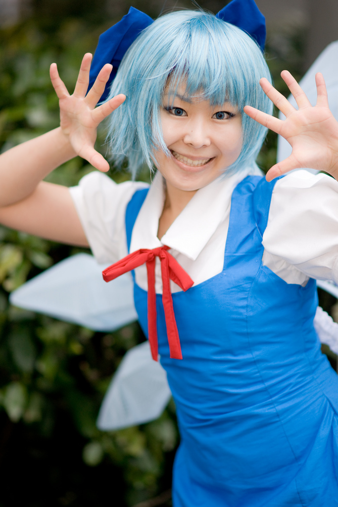 blue_eyes blue_hair cirno cosplay grin photo smile solo touhou