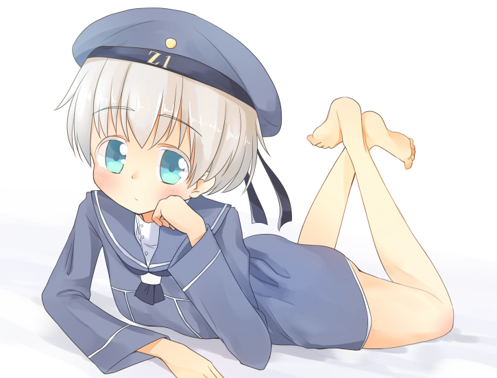 aiba_kou barefoot blue_eyes blush chin_rest clothes_writing crossed_legs dress hat kantai_collection looking_at_viewer lying on_stomach sailor_dress sailor_hat short_hair silver_hair solo z1_leberecht_maass_(kantai_collection)