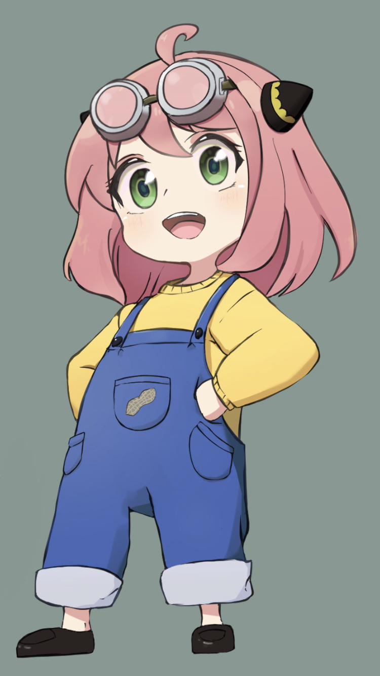 1girl :d ahoge anya_(spy_x_family) blue_overalls child commentary full_body goggles goggles_on_head green_background green_eyes hairpods hands_on_own_hips highres legs_apart nekonosuke overalls peanut pink_hair shirt simple_background smile solo spy_x_family symbol-only_commentary teeth upper_teeth_only yellow_shirt