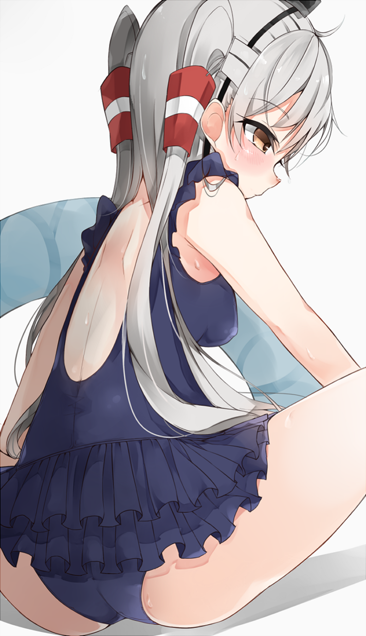 amatsukaze_(kantai_collection) ass blush brown_eyes cole double_flare_skirt_one-piece frilled_swimsuit frills hair_tubes highres innertube kantai_collection long_hair nontraditional_school_swimsuit one-piece_swimsuit school_swimsuit silver_hair sitting solo spread_legs swimsuit two_side_up