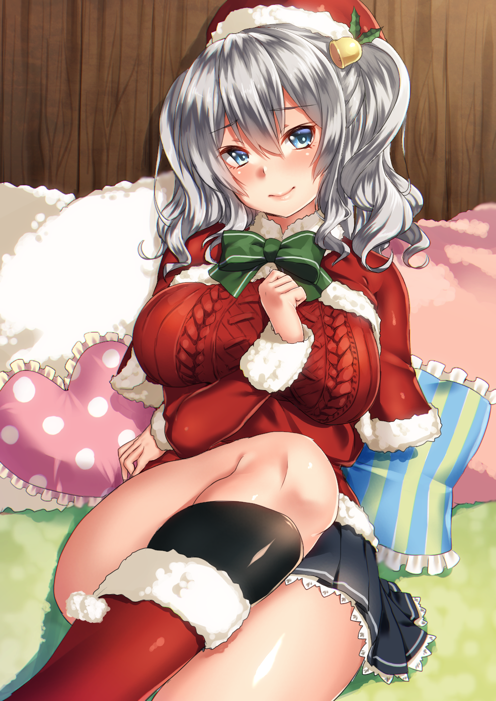 alternate_costume aran_sweater black_legwear blue_eyes blue_skirt blush boots bow breasts christmas_ornaments eyebrows_visible_through_hair frilled_pillow frills fur-trimmed_boots fur_trim green_bow hair_between_eyes hair_ornament hat heart heart_pillow highres indoors jacket kantai_collection kashima_(kantai_collection) keita_(tundereyuina) large_breasts long_sleeves looking_at_viewer on_bed pillow pleated_skirt red_footwear red_jacket santa_hat silver_hair skirt smile socks solo sweater twintails wooden_wall
