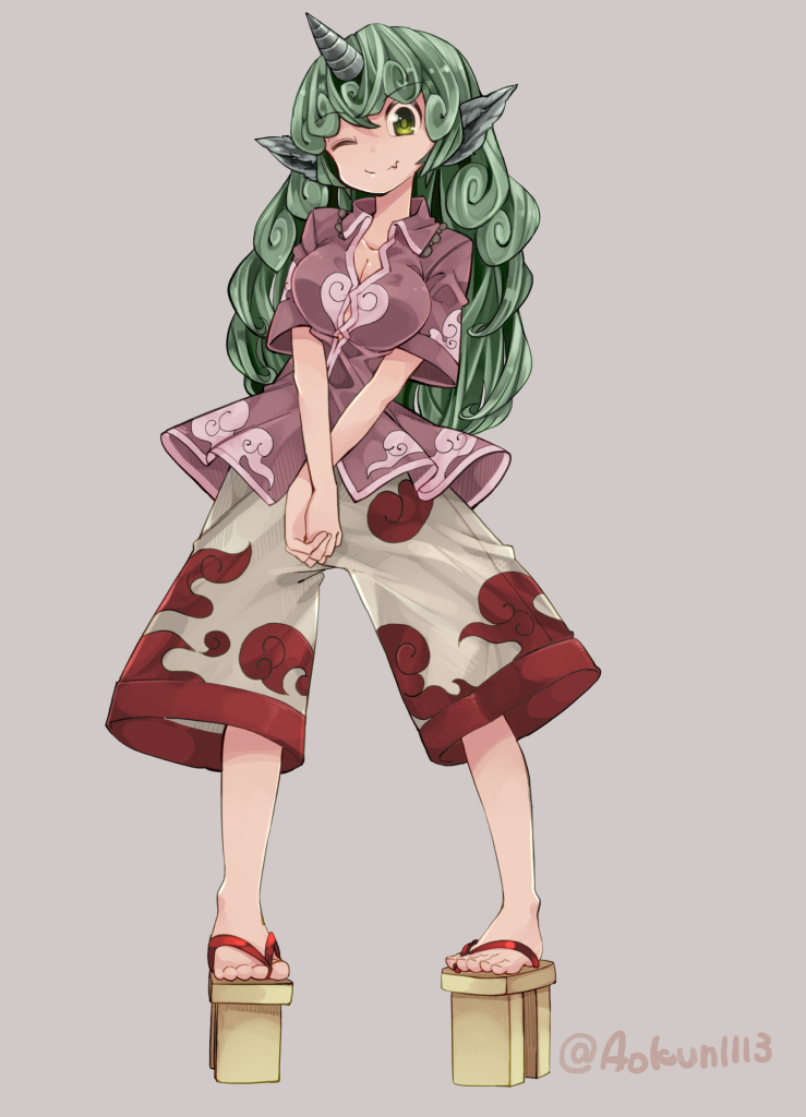 ;) aioi_aoi animal_ears breasts cleavage closed_mouth cloud_print collared_shirt commentary_request curly_hair fang_out full_body geta green_eyes green_hair horn kariyushi_shirt komano_aun large_breasts long_hair looking_at_viewer one_eye_closed platform_footwear shirt short_sleeves shorts simple_background smile solo touhou twitter_username v_arms