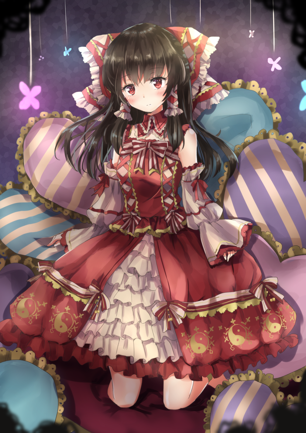 adapted_costume bangs black_hair bow brown_hair dress embellished_costume frilled_dress frills full_body hair_bow hair_tubes hakurei_reimu heart heart_pillow highres kneehighs kneeling looking_at_viewer pillow red_bow red_dress red_eyes shironeko_yuuki sleeves_past_wrists solo striped_pillow touhou yin_yang