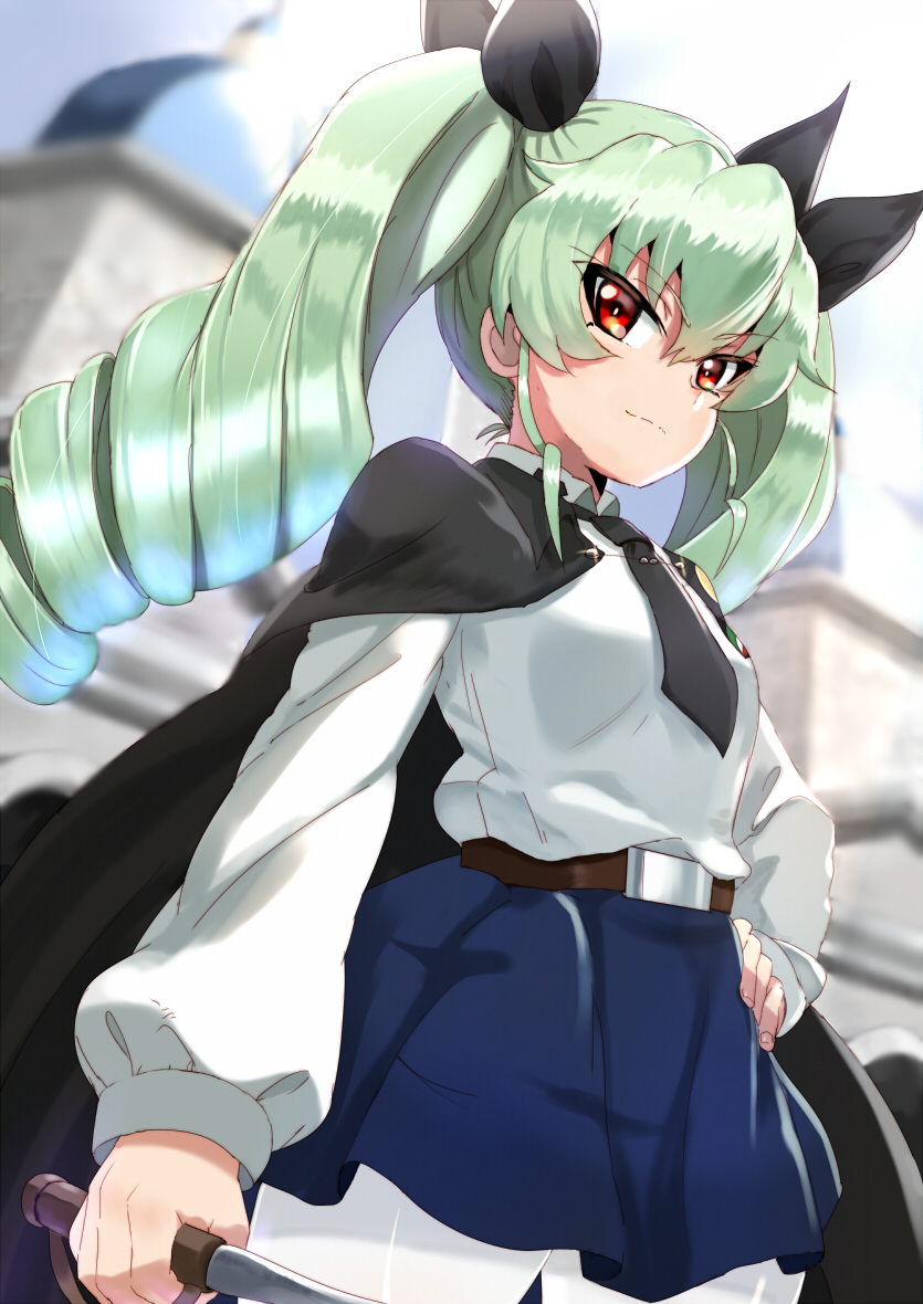 alknasn anchovy anzio_school_uniform bangs belt black_belt black_cape black_neckwear black_ribbon black_skirt blue_skirt blurry blurry_background cape closed_mouth commentary cowboy_shot depth_of_field dress_shirt drill_hair emblem eyebrows_visible_through_hair eyes_visible_through_hair girls_und_panzer green_hair hair_ribbon hand_on_hip holding landmark light_smile long_hair long_sleeves looking_at_viewer miniskirt necktie pantyhose piazza_del_popolo pleated_skirt red_eyes ribbon riding_crop school_uniform shirt skirt solo standing twin_drills twintails white_legwear white_shirt