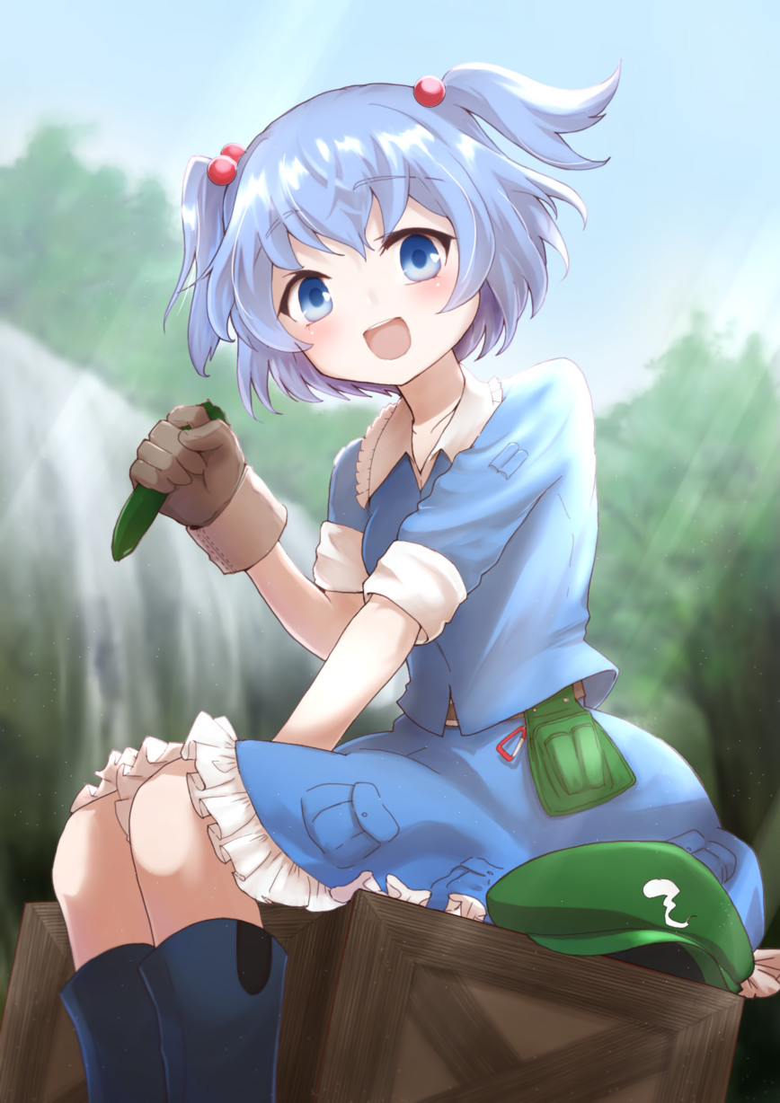 blue_eyes blue_footwear blue_hair blue_shirt blue_skirt boots brown_gloves collared_shirt commentary crate cucumber day food forest frilled_skirt frills gloves green_hat hair_bobbles hair_ornament hat hat_removed headwear_removed highres holding holding_food holding_vegetable kawashiro_nitori kotarou_(yukina1721) looking_at_viewer nature open_mouth outdoors petticoat shirt short_sleeves sitting skirt sky smile solo touhou two_side_up water waterfall