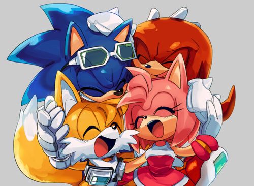 1girl 3boys amy_rose eyes_closed eyewear_on_head friends goggles goggles_around_neck group_hug hand_on_another's_head happy hug knuckles_the_echidna laughing lowres multiple_boys open_mouth smile sonic sonic_riders sonic_the_hedgehog sunglasses tails_(sonic)