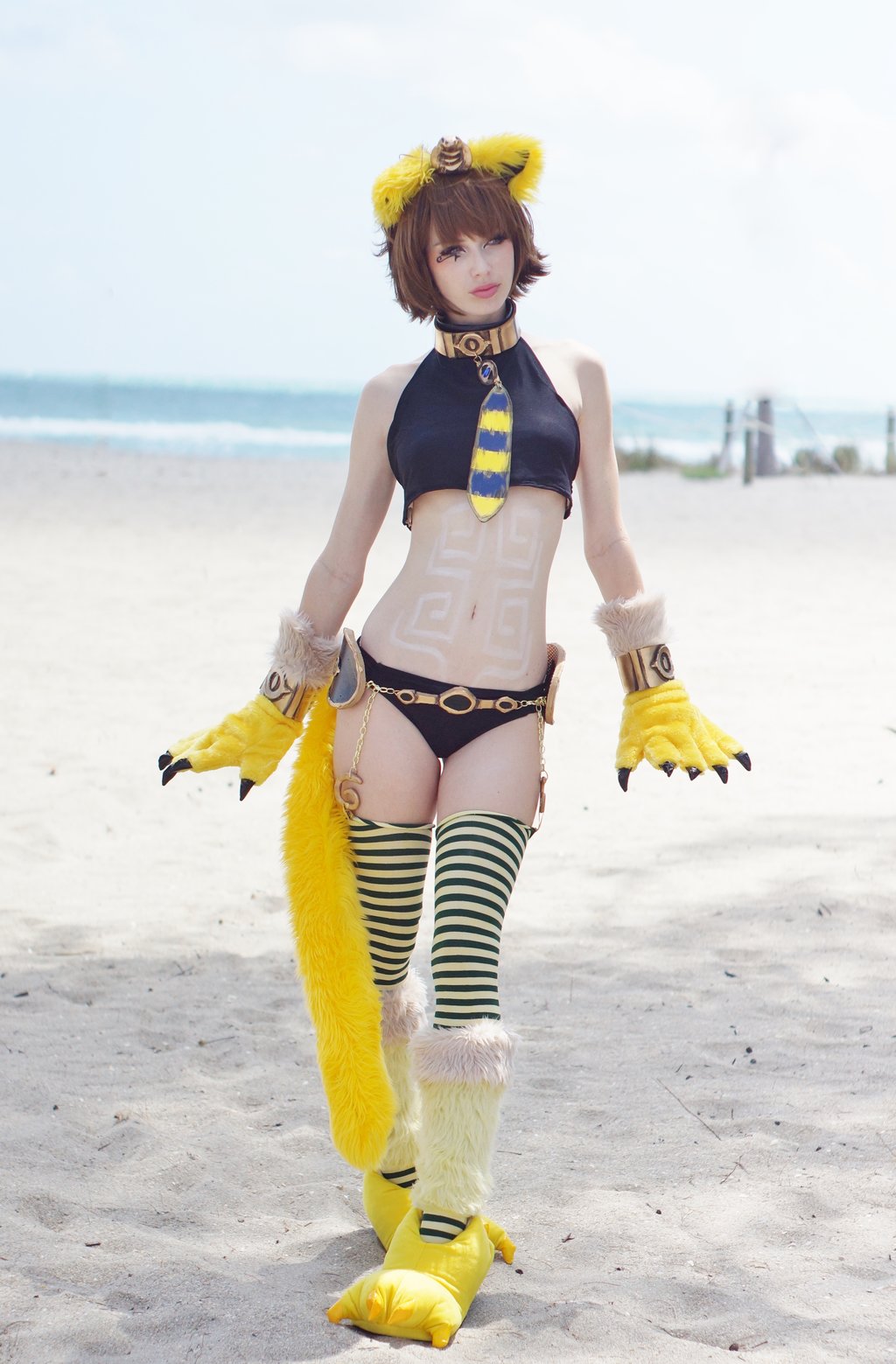 1girl animal_ears beach bodypaint cat_ears cat_tail cosplay egyptian gray_eyes mamono_girl_lover monster_girl monster_girl_encyclopedia ocean personification revealing_clothes solo sphinx sphinx_(mamono_girl_lover) sphinx_(monster_girl_encyclopedia) tail