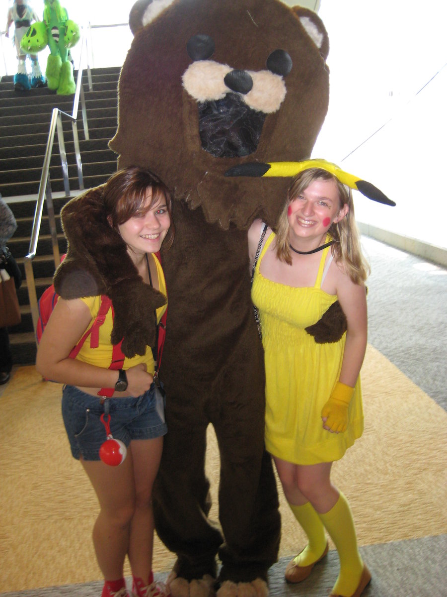 2girls cosplay costume looking_at_viewer multiple_girls outside pedobear photo pokemon tagme