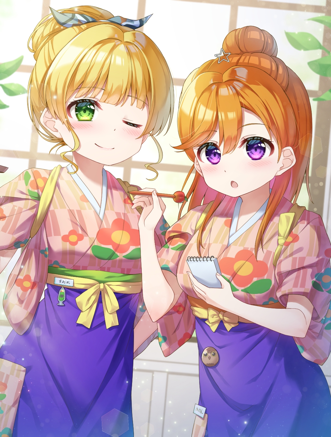 2girls ;) alternate_costume alternate_hairstyle blonde_hair blue_skirt blush closed_mouth commentary_request demekingyo floral_print floral_print_kimono hair_bun hakama heanna_sumire highres holding holding_notepad indoors japanese_clothes kimono love_live! love_live!_superstar!! multiple_girls notepad one_eye_closed open_mouth orange_hair pink_kimono print_kimono shibuya_kanon single_hair_bun skirt smile tasuki waitress