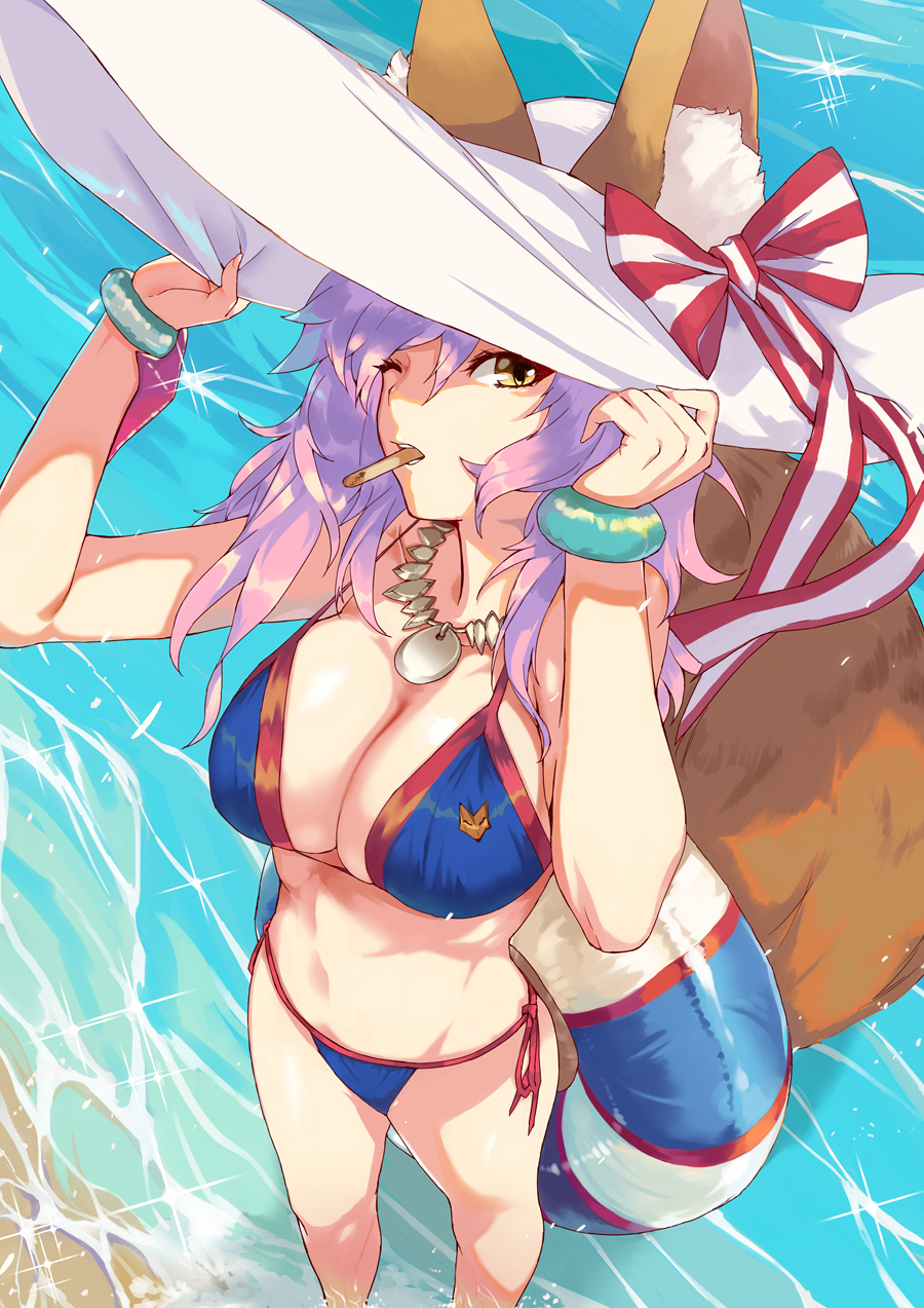 animal_ear_fluff animal_ears beach bikini blue_bikini bow bracelet breasts cleavage collar commentary_request day ears_through_headwear fate/extra fate/grand_order fate_(series) food food_in_mouth fox_ears fox_tail from_above hands_on_headwear hat hat_bow highres innertube jewelry large_breasts long_hair mouth_hold ohland one_eye_closed parted_lips pink_hair popsicle side-tie_bikini solo standing sun_hat swimsuit tail tamamo_(fate)_(all) tamamo_no_mae_(swimsuit_lancer)_(fate) wading water waves yellow_eyes