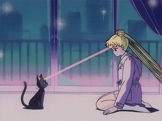 1girl animal animated animated_gif bishoujo_senshi_sailor_moon blonde_hair cat long_hair luna_(sailor_moon) solo tsukino_usagi