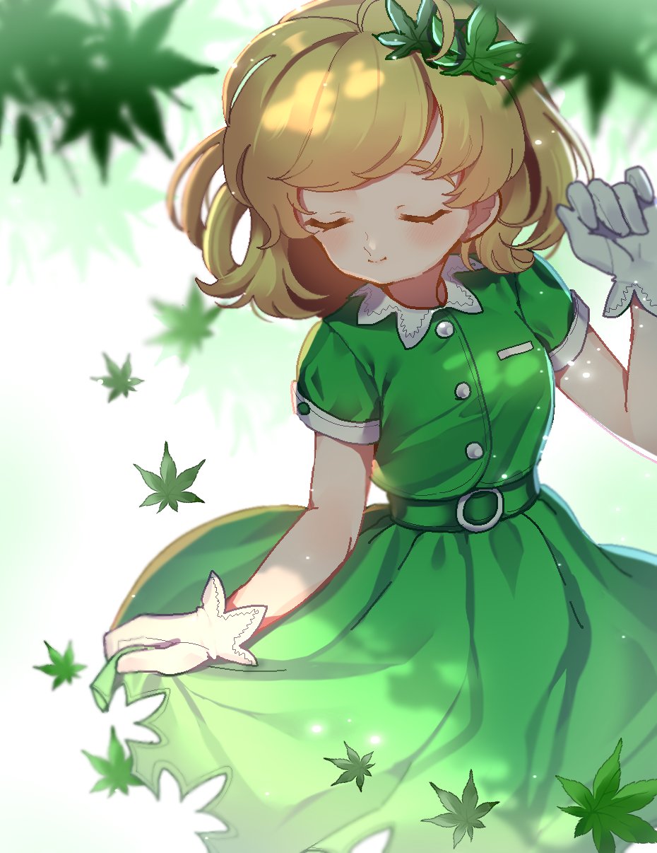 aki_shizuha alternate_color bangs belt blonde_hair blurry_foreground breasts commentary cowboy_shot day dress flower gloves green_dress hair_flower hair_ornament hand_up highres leaf light_particles maple_leaf satomachi short_hair short_sleeves small_breasts smile solo summer touhou tree_shade white_gloves