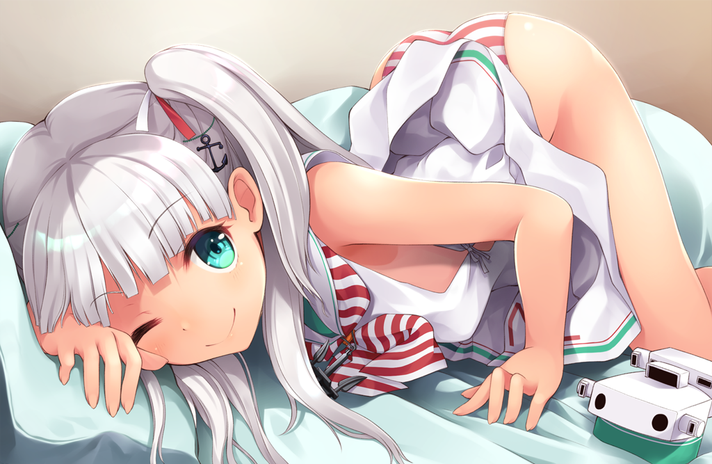 ;) anchor_hair_ornament ass bangs bed_sheet blush commentary_request dress eyebrows_visible_through_hair green_eyes hair_ornament hair_ribbon kantai_collection long_hair looking_at_viewer maestrale_(kantai_collection) mofu_namako one_eye_closed one_side_up open_mouth panties pillow ribbon sailor_collar sailor_dress sidelocks silver_hair sleeveless sleeveless_dress smile solo striped striped_neckwear striped_panties tan thighs top-down_bottom-up underwear white_dress