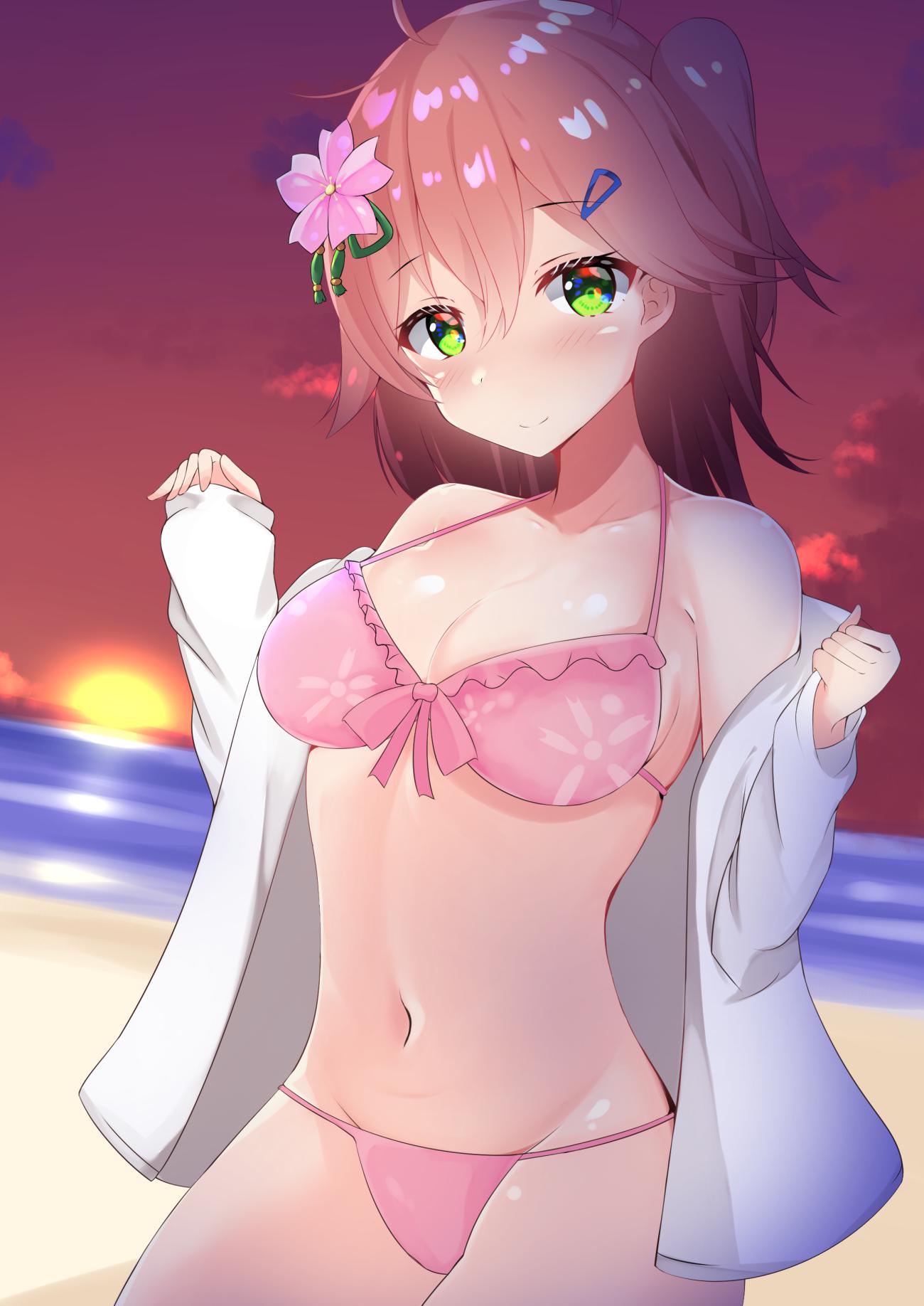 1girl ahoge alternate_costume bangs bare_shoulders beach bikini blush breasts cherry_blossom_print cherry_blossoms cleavage collarbone eyebrows_visible_through_hair flower green_eyes groin hair_between_eyes hair_flower hair_ornament hairclip highres hololive long_sleeves looking_at_viewer medium_breasts medium_hair navel ocean one_side_up outdoors pink_bikini pink_bikini_bottom pink_bikini_top pink_hair pink_swimsuit sakura_miko sand sky sleeves_past_elbows solo sun sunset swimsuit virtual_youtuber water zatu