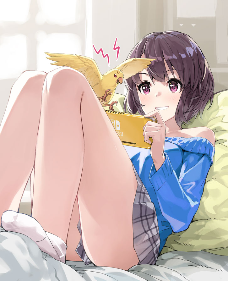 1girl anger_vein ass bangs bare_shoulders bird black_hair blue_sweater blush breasts commentary_request eyebrows_visible_through_hair grey_skirt holding_handheld_game_console long_sleeves lying medium_breasts nintendo_switch on_back original parakeet pillow purple_eyes short_hair skirt smile solo sweater teeth white_legwear yahako