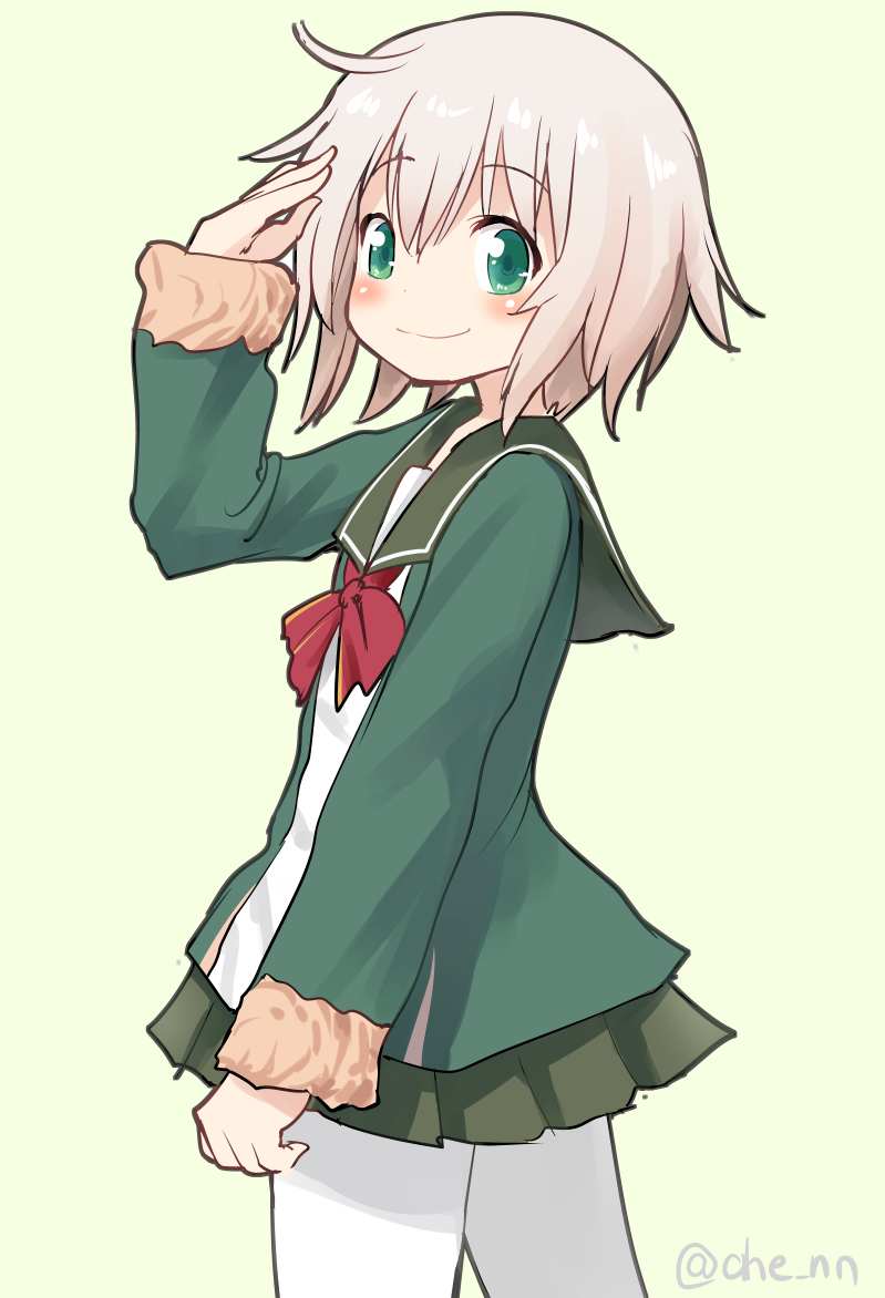 1girl ahenn blonde_hair blush eyebrows_visible_through_hair fur fur_trim green_background green_eyes green_jacket green_skirt hair_between_eyes jacket kantai_collection long_sleeves neck_ribbon pantyhose pleated_skirt red_ribbon ribbon shimushu_(kantai_collection) short_hair simple_background skirt smile solo twitter_username white_legwear