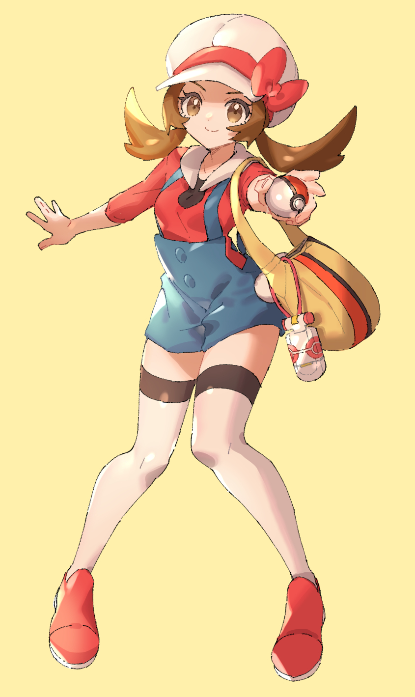 1girl ankea_(a-ramo-do) blue_shorts bow brown_eyes brown_hair closed_mouth collarbone floating_hair full_body hair_bow hat highres holding holding_poke_ball kotone_(pokemon) long_hair outstretched_arm poke_ball pokemon pokemon_(game) pokemon_hgss red_bow red_footwear red_shirt shiny shiny_hair shirt short_shorts shorts simple_background smile solo standing suspender_shorts suspenders thighhighs white_headwear white_legwear yellow_background