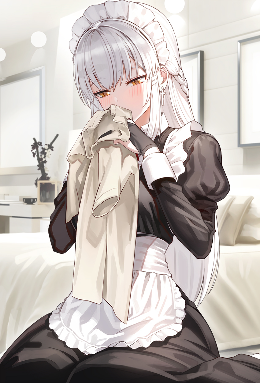 1girl apron bangs bed bedroom black_dress black_gloves blush braid clothes_sniffing commentary_request cross cup dress earrings eyebrows_visible_through_hair frame gloves highres holding holding_clothes holding_shirt jewelry kfr long_hair maid maid_apron maid_dress maid_headdress original partly_fingerless_gloves pillow shirt sidelocks sitting smelling solo very_long_hair wariza white_hair yellow_eyes