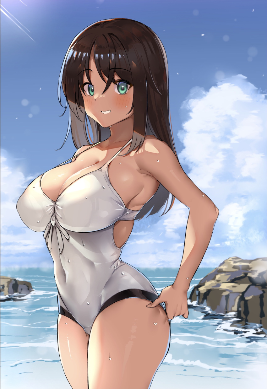 1girl alice_gear_aegis bangs beach blush breasts brown_hair cleavage cloud cloudy_sky dark-skinned_female dark_skin green_eyes grin highres kaneshiya_sitara large_breasts long_hair looking_at_viewer one-piece_swimsuit rock shingo. sky smile solo swimsuit wet white_swimsuit