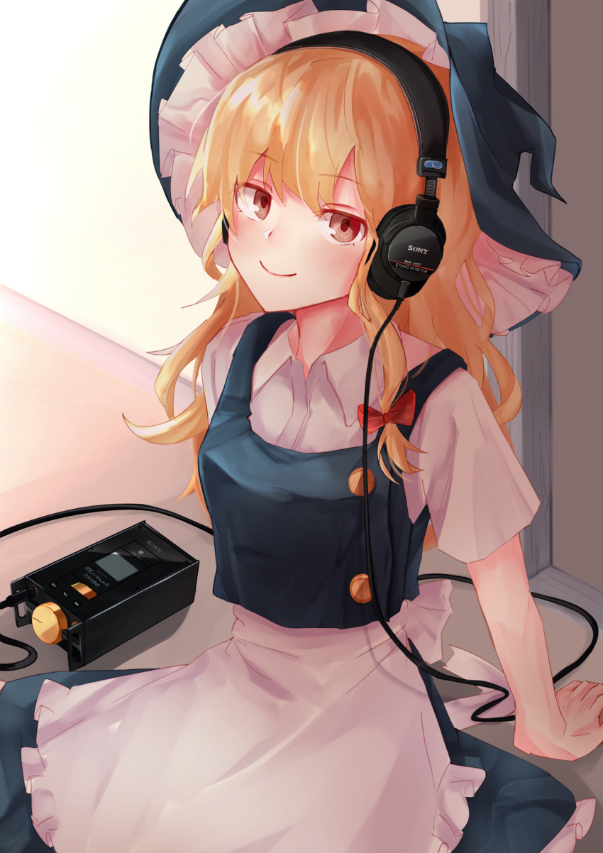 1girl absurdres apron arm_support black_headwear black_skirt black_vest blonde_hair buttons closed_mouth frilled_apron frilled_hat frills happy hat headphones highres kirisame_marisa long_hair looking_at_viewer puffy_short_sleeves puffy_sleeves shirt short_sleeves sitting skirt smile solo sony taguno touhou vest waist_apron walkman white_apron white_shirt witch witch_hat yellow_eyes