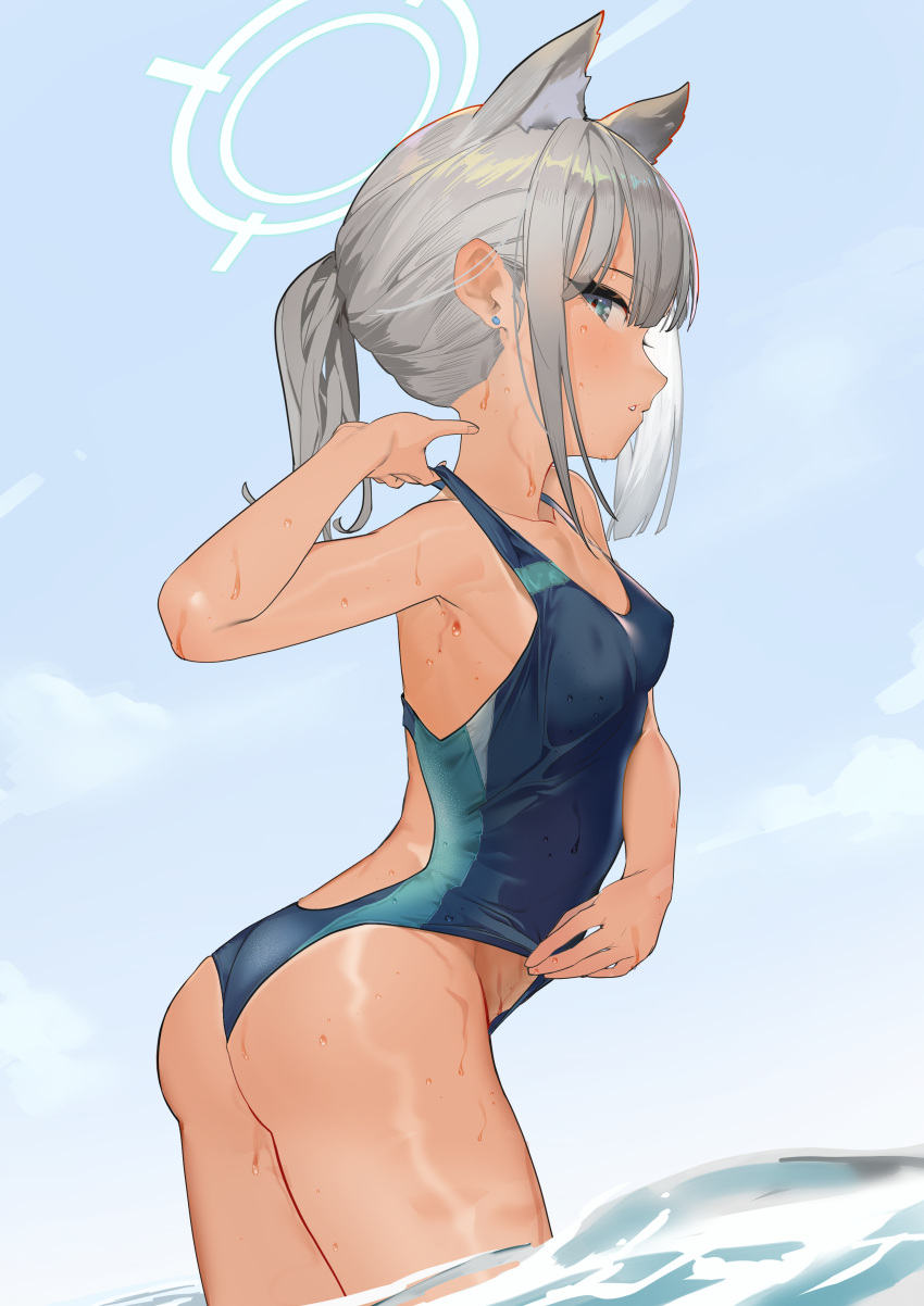 1girl absurdres adjusting_clothes adjusting_swimsuit animal_ear_fluff animal_ears arched_back ass blue_archive blue_eyes blush breasts collarbone competition_swimsuit earrings grey_hair halo highres jewelry leaning_forward looking_at_viewer nuda one-piece_swimsuit shiroko_(blue_archive) sky small_breasts solo stud_earrings swimsuit tan tanlines wading water wet