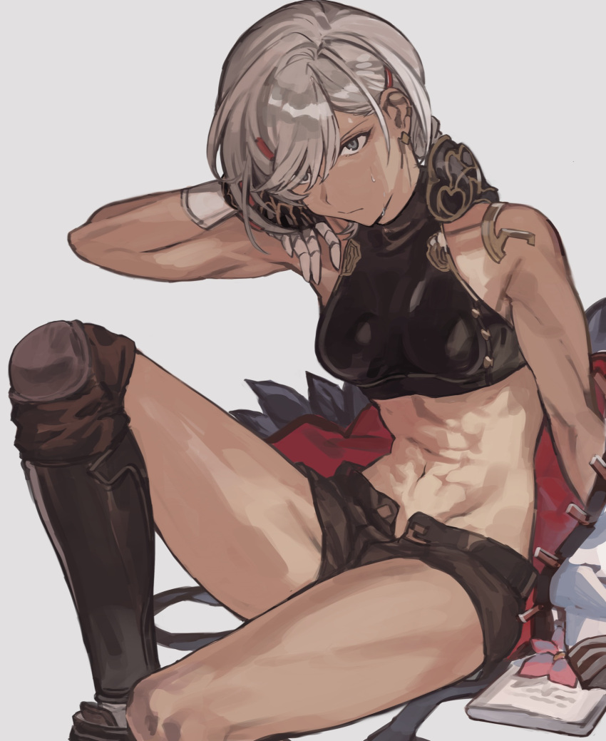 1girl armor bangs breasts brown_shorts closed_mouth crop_top dark-skinned_female dark_skin ear_bar feet_out_of_frame fiorito_(granblue_fantasy) gloves granblue_fantasy greaves grey_background grey_hair hashibiro_kou_(garapiko_p) highres jacket jacket_removed knee_pads looking_at_viewer midriff navel short_hair short_shorts shorts simple_background single_greave single_knee_pad sitting small_breasts solo sweatdrop toned wiping_sweat