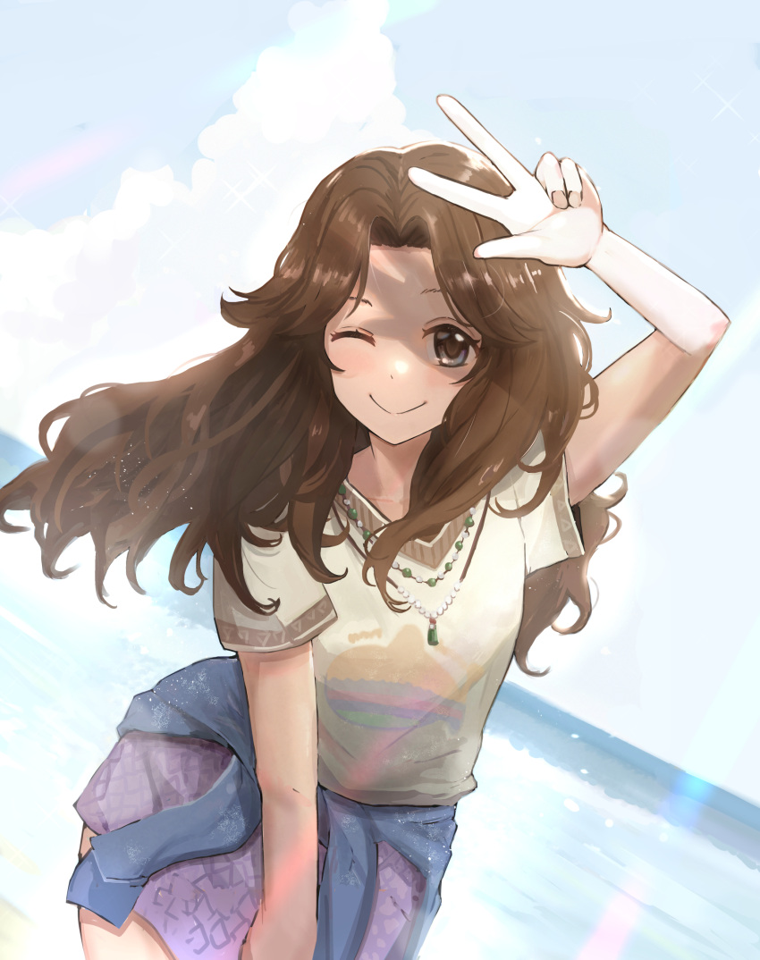 1girl ;) absurdres ariura_kanna arm_up bangs beach brown_hair clothes_around_waist cloud curtained_hair dutch_angle highres horizon idolmaster idolmaster_cinderella_girls jacket jacket_around_waist long_hair looking_at_viewer one_eye_closed outdoors parted_bangs smile solo w wep_(worldenddancer)