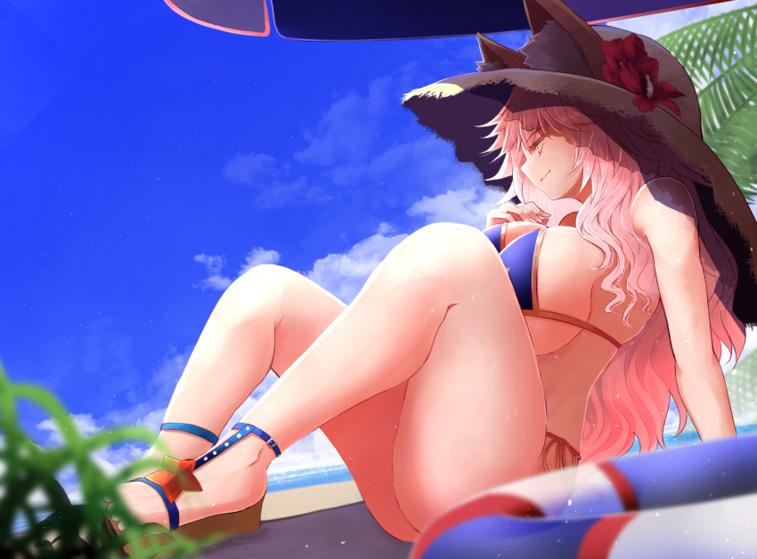 1girl animal_ears arano_oki bikini blue_bikini blue_sky breasts cloud day ears_through_headwear fate/grand_order fate_(series) fox_ears fox_girl fox_tail hat huge_breasts long_hair outdoors pink_hair sandals side-tie_bikini sitting sky solo straw_hat sun_hat swimsuit tail tamamo_(fate) tamamo_no_mae_(swimsuit_lancer)_(fate) yellow_eyes