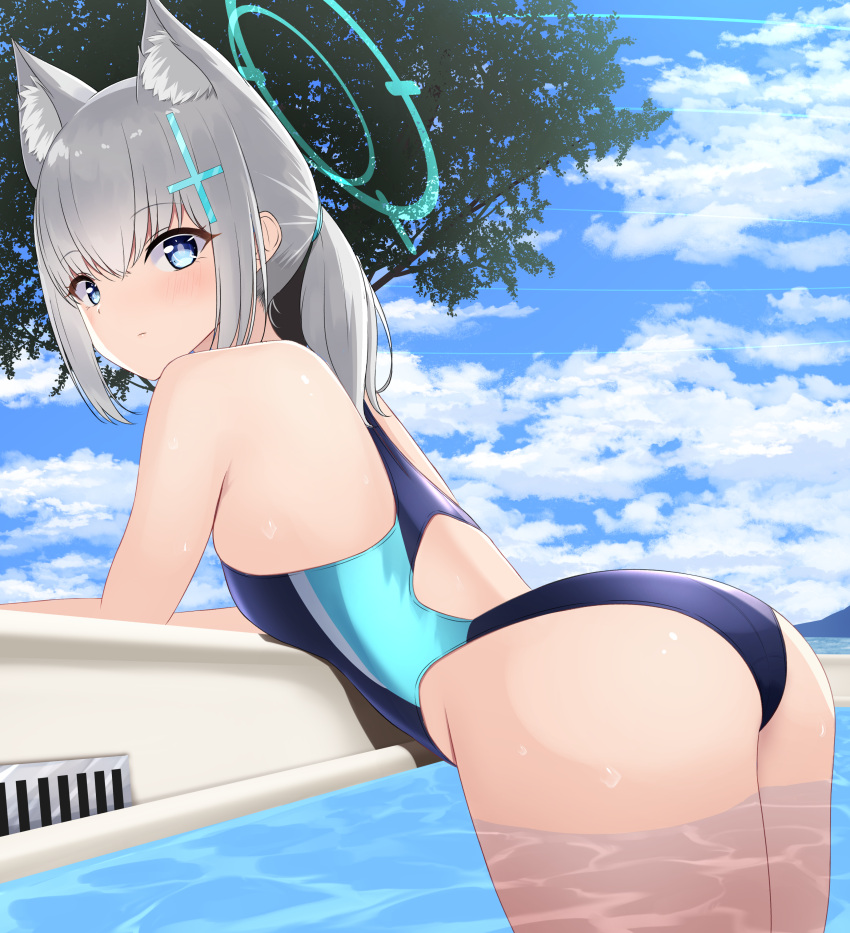 1girl absurdres animal_ear_fluff animal_ears ass bangs black_swimsuit blue_archive blue_eyes blue_sky cloud competition_swimsuit cowboy_shot cross_hair_ornament day extra_ears from_behind grey_hair hair_ornament halo highres leaning_forward looking_at_viewer low_ponytail medium_hair mismatched_pupils multicolored_clothes multicolored_swimsuit nokonoko one-piece_swimsuit outdoors shiroko_(blue_archive) shiroko_(swimsuit)_(blue_archive) sky solo swimsuit tree water