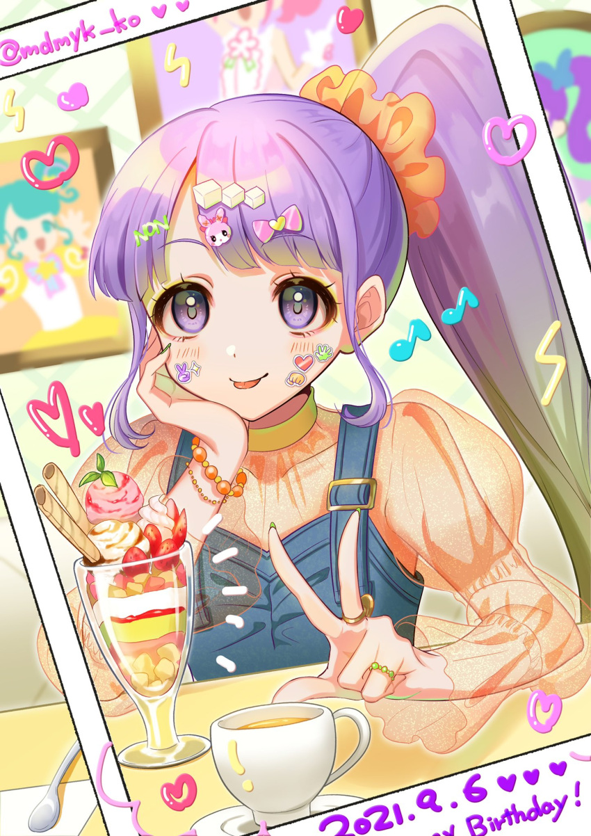 1girl blunt_bangs bracelet character_hair_ornament cup hair_ornament hair_scrunchie hand_on_own_cheek hand_on_own_face happy_birthday highres indoors jewelry juliet_sleeves junon_(pripara) kanon_(pripara) long_hair long_sleeves looking_at_viewer manaka_non mendamen nail_polish orange_shirt parfait picture_frame pinon_(pripara) polaroid portrait_(object) pretty_series pripara puffy_sleeves purple_eyes purple_hair ring scrunchie see-through see-through_shirt shirt side_ponytail smile solo spoon sticker_on_face tongue tongue_out twitter_username upper_body usacha w