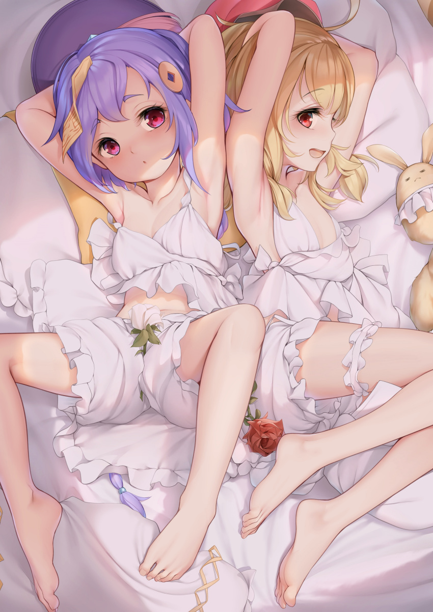 2girls absurdres an-telin armpits arms_behind_head arms_up bangs bare_arms barefoot blonde_hair blush bridal_garter dodoco_(genshin_impact) feet flower genshin_impact highres klee_(genshin_impact) long_hair looking_at_another lying multiple_girls ofuda on_back on_bed on_side open_mouth parted_lips purple_hair qiqi_(genshin_impact) red_eyes red_flower red_rose rose shirt shorts sideways_glance sleeveless sleeveless_shirt smile very_long_hair white_shirt white_shorts